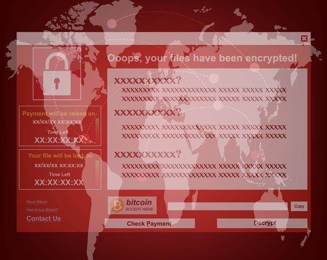 WannaCry勒索病毒会锁住受感染的电脑，并要求使用电脑的人付出「赎金」，才能解开电脑。 (图 / 載自Shutterstock)